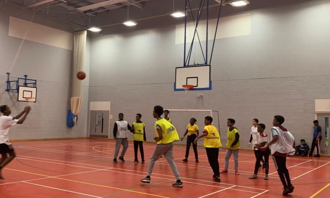 young people on basket ball court