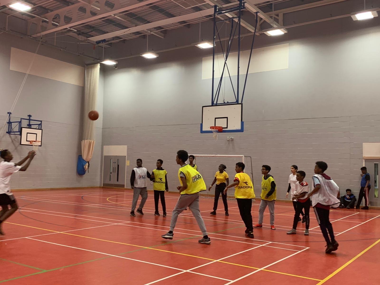 young people on basket ball court